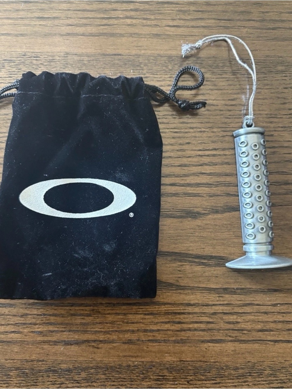 OAKLEY EMPLOYEE BICYCLE GRIP CHRISTMAS ORNAMENT 2010 METAL LIMITED & NUMBERED